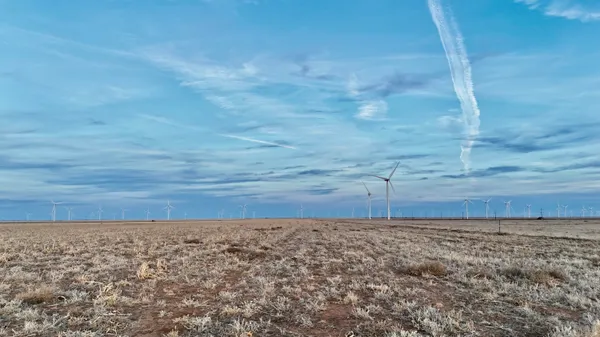 a view of a field with an outdoor space