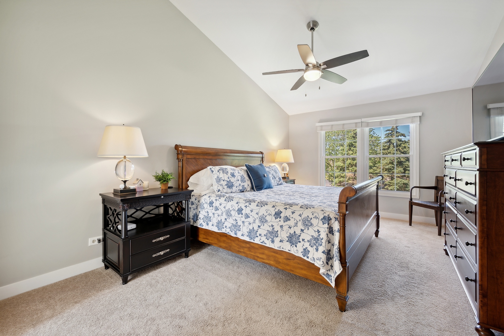 27W204 Chelsea Circle Winfield, IL 60190 - Photo 13 of 30 a bedroom with a bed and a chandelier
