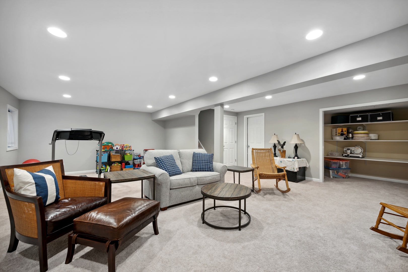 27W204 Chelsea Circle Winfield, IL 60190 - Photo 21 of 30 a living room with furniture and a flat screen tv