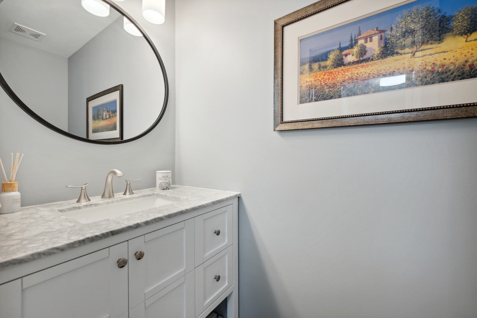27W204 Chelsea Circle Winfield, IL 60190 - Photo 22 of 30 a bathroom with a granite countertop sink and a mirror