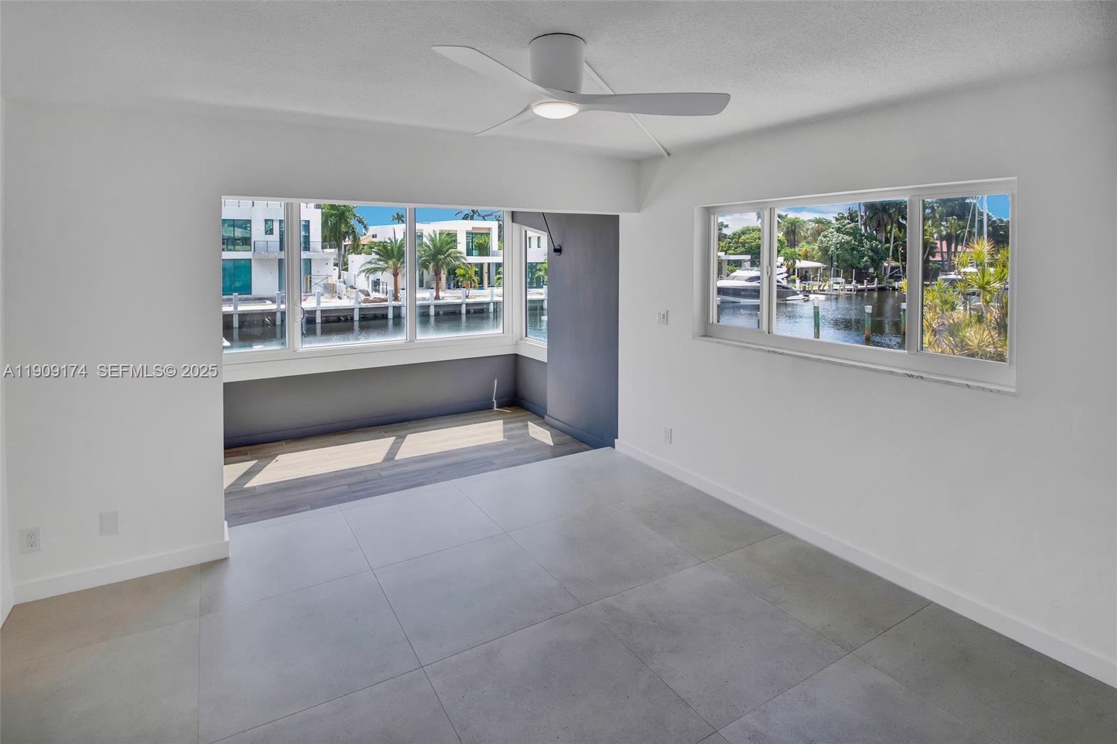 54 Isle Of Venice Drive, Unit 7 Fort Lauderdale, FL 33301 - Photo 13 of 41 a view of an empty room with a window