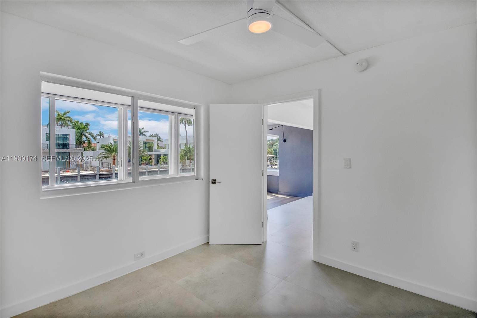 54 Isle Of Venice Drive, Unit 7 Fort Lauderdale, FL 33301 - Photo 31 of 41 an empty room with windows