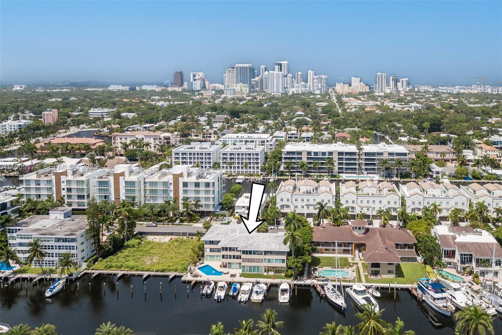 54 Isle Of Venice Drive, Unit 7 Fort Lauderdale, FL 33301 - Photo 39 of 41 an aerial view of residential building and lake