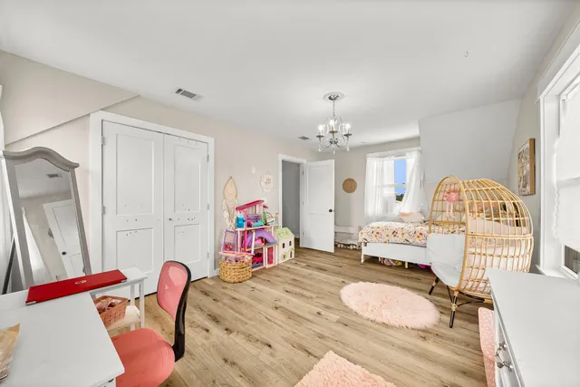 a view of a livingroom with furniture