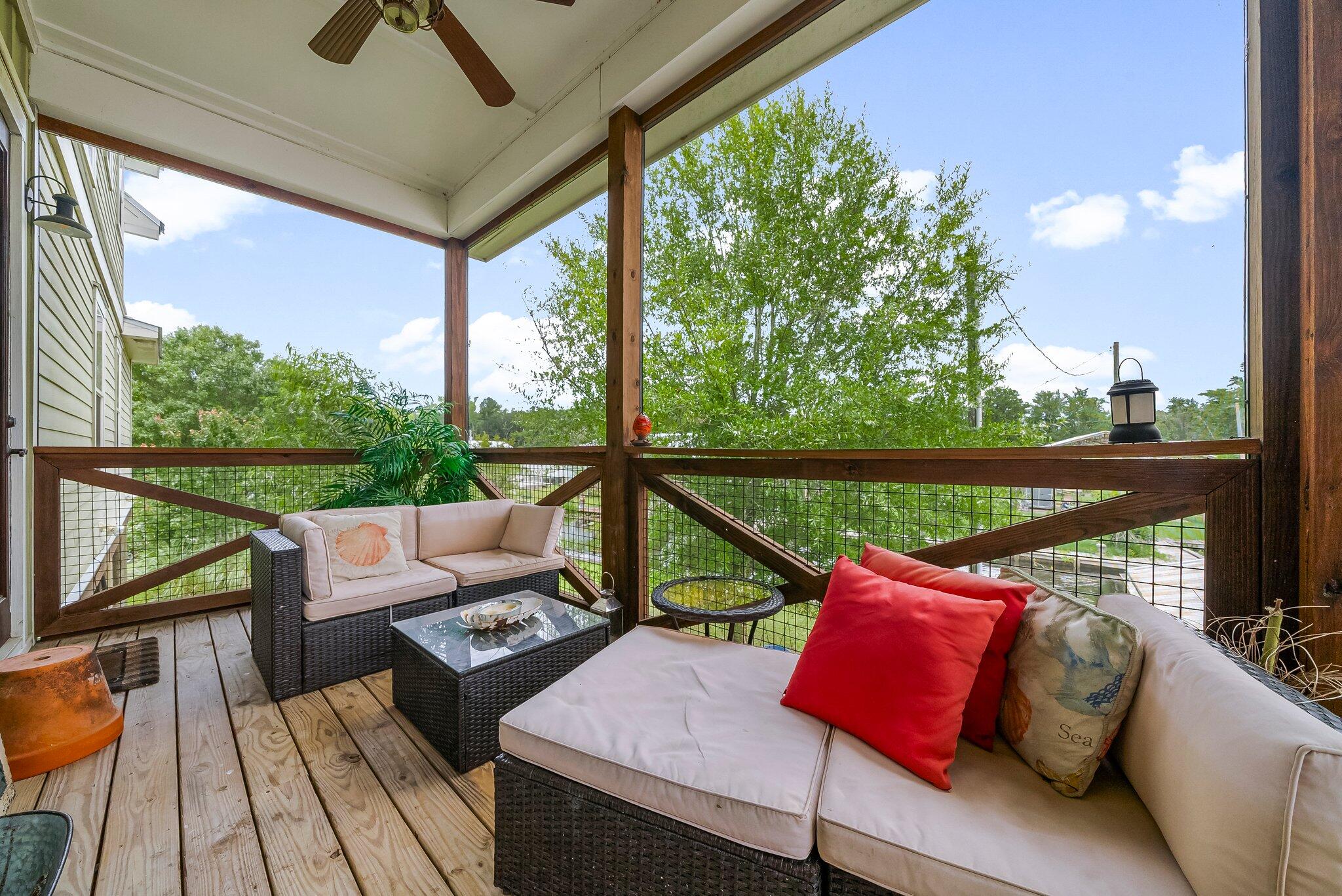 71 Childers Lane Freeport, FL 32439 - Photo 27 of 48 a view of deck with couches and wooden floor