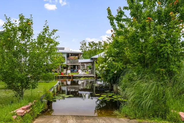 a view of swimming pool with a patio