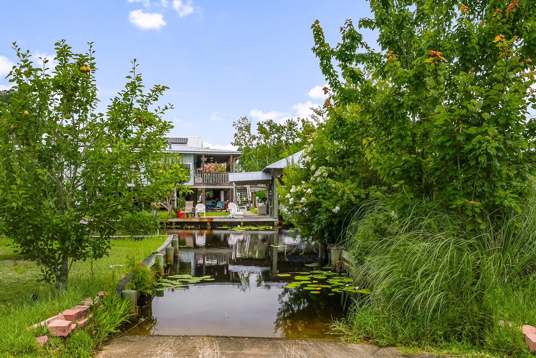 71 Childers Lane Freeport, FL 32439 - Photo 39 of 48 a view of a house with a yard