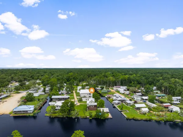 a view of a lake with a city