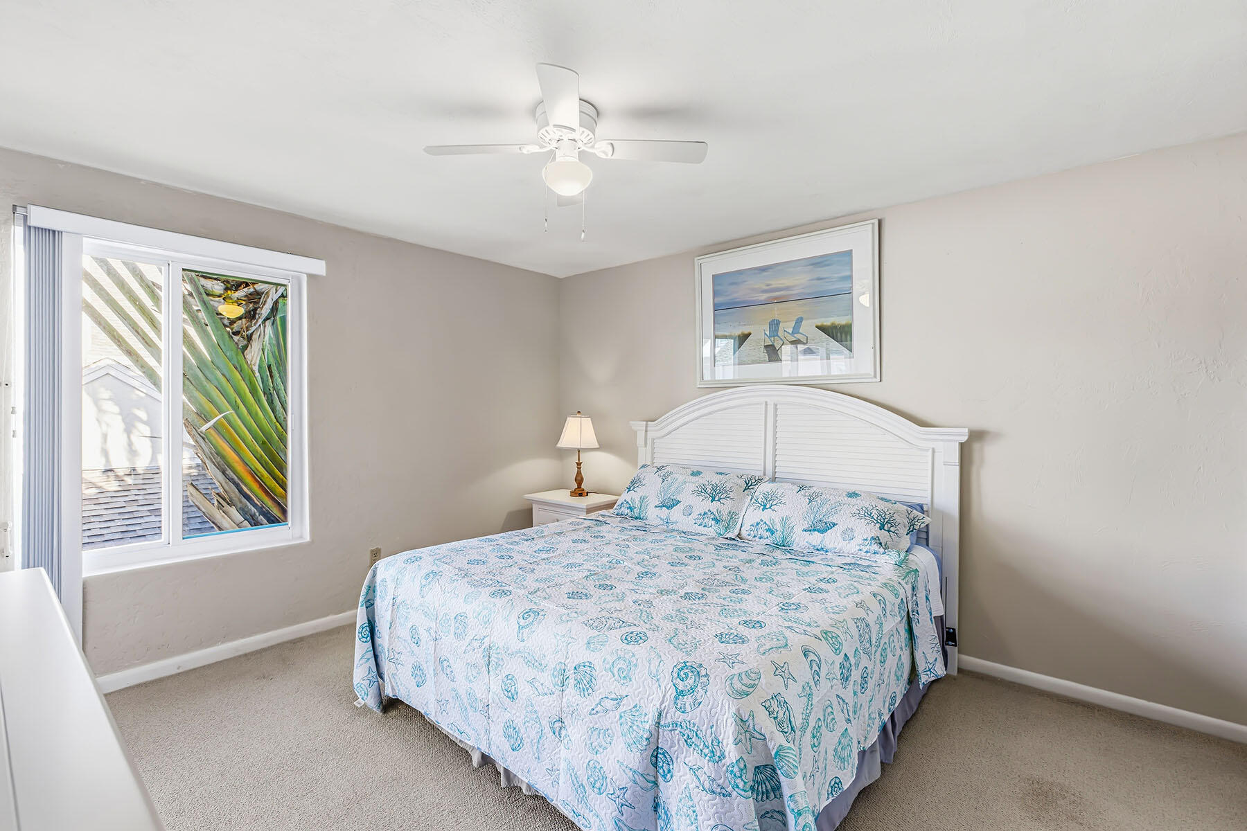 2189 San Marco Road, Unit 201 Marco Island, FL 34145 - Photo 16 of 27 a bedroom with a bed and a window