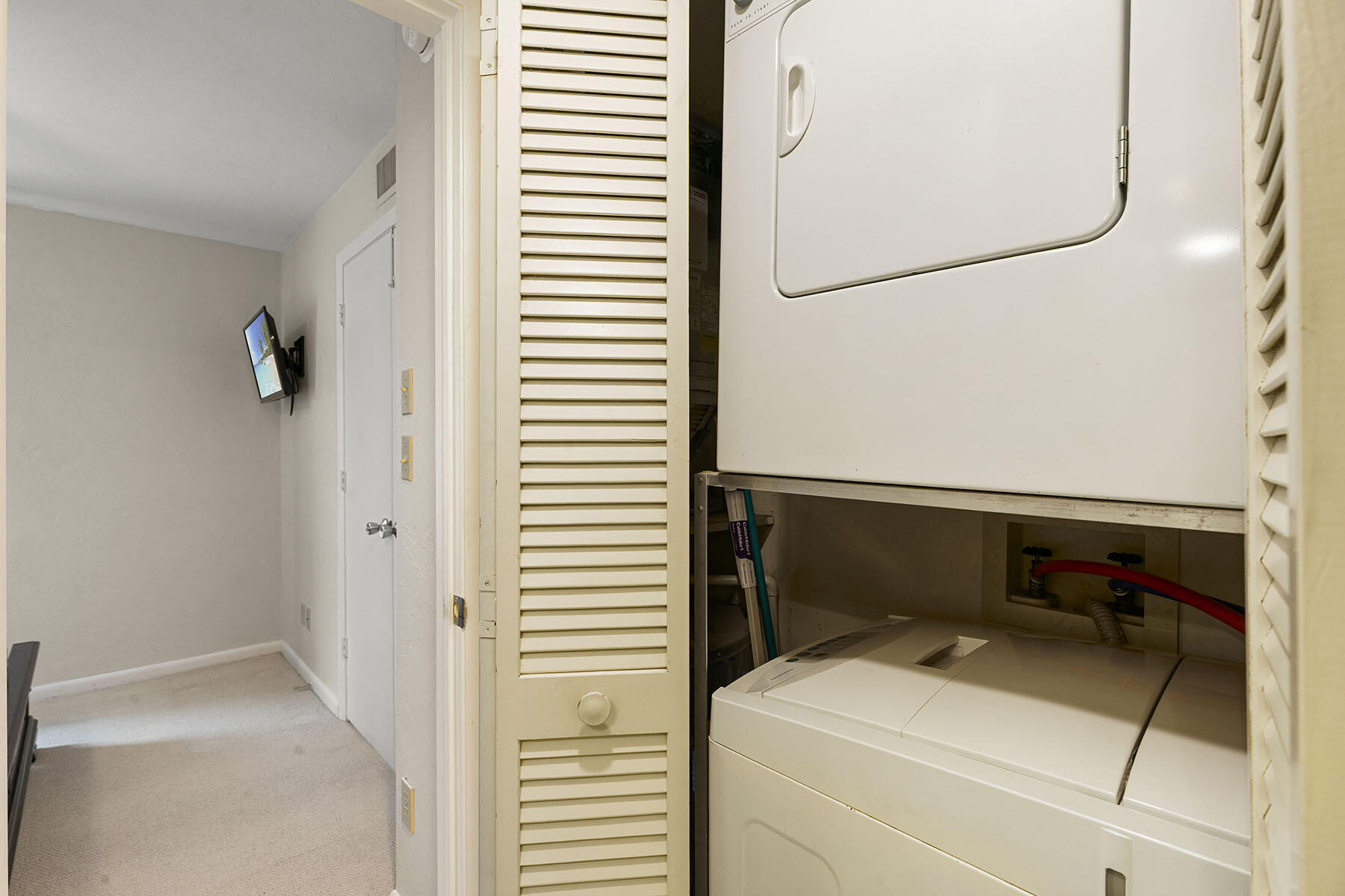 2189 San Marco Road, Unit 201 Marco Island, FL 34145 - Photo 20 of 27 a utility room with dryer and washer
