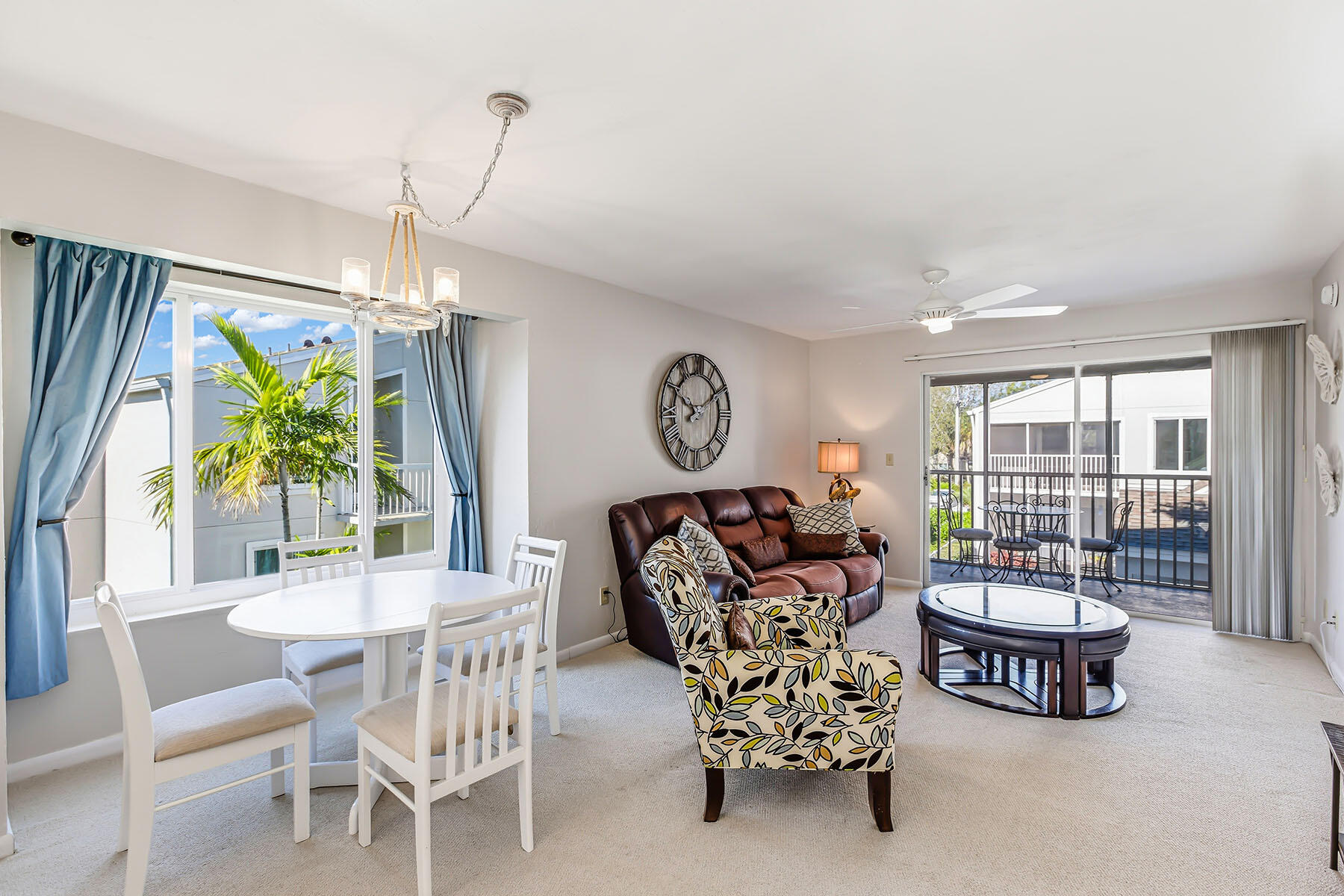 2189 San Marco Road, Unit 201 Marco Island, FL 34145 - Photo 9 of 27 a living room with furniture and a table