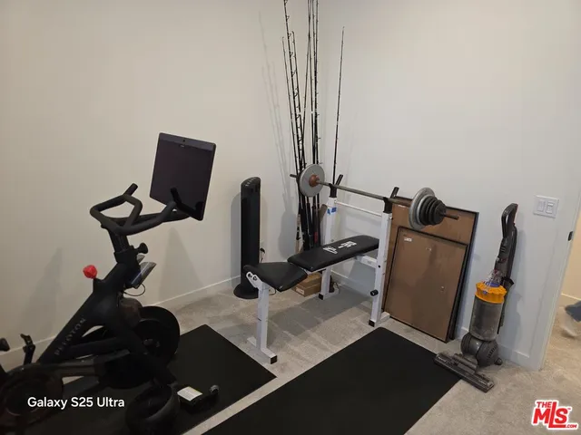 a view of workspace with gym equipment