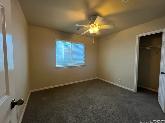 a bathroom with a sink double vanity and a mirror
