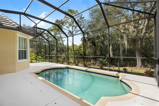 a view of a house with swimming pool
