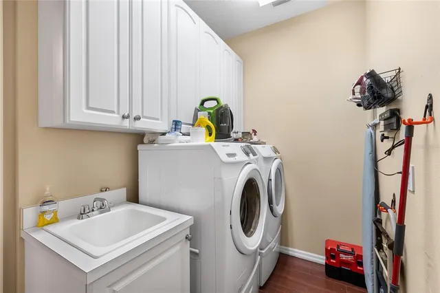 a utility room with dryer and washer
