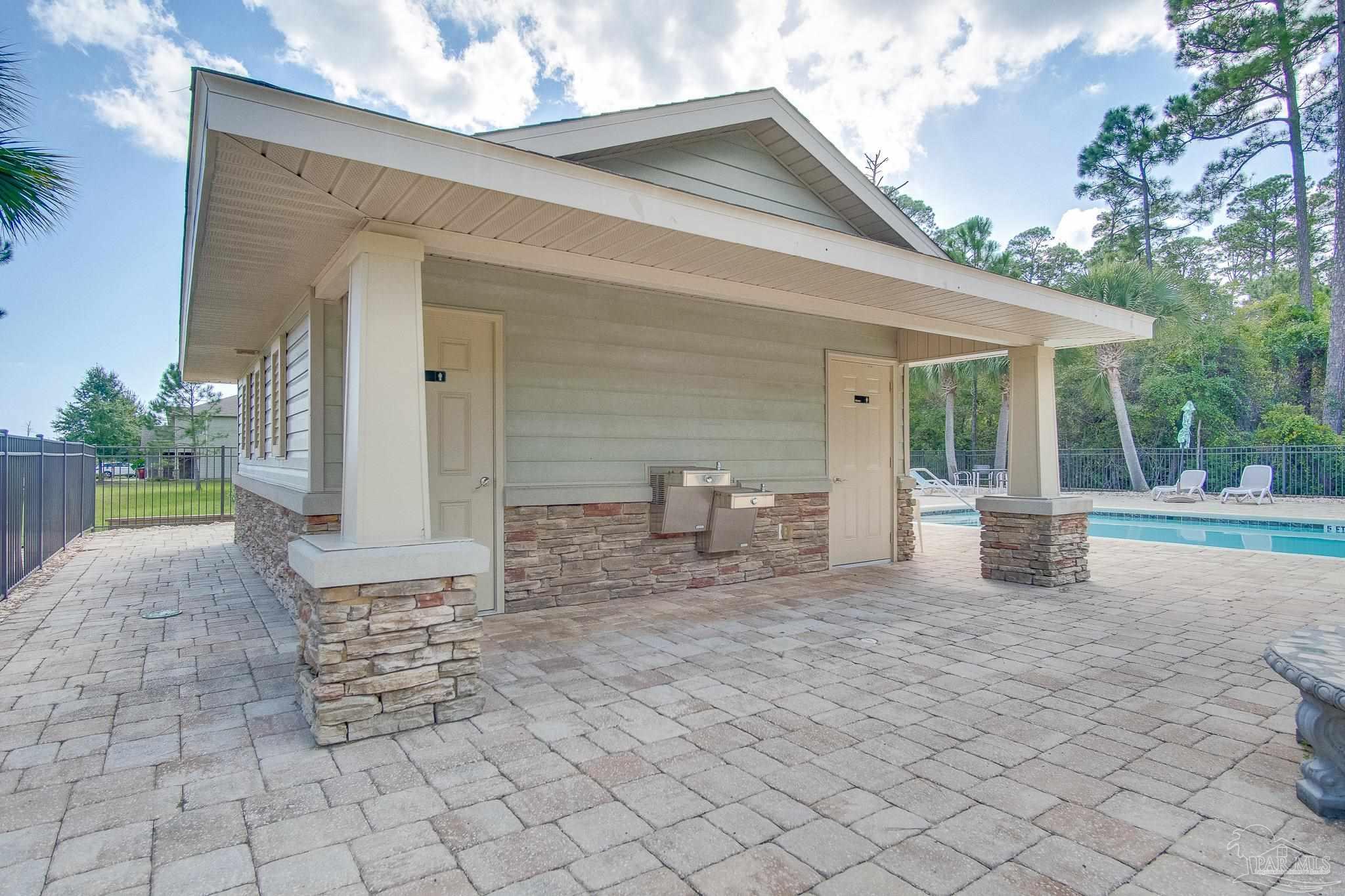 1768 Sound Haven Court Navarre, FL 32566 - Photo 7 of 39 a view of a house with backyard and sitting area