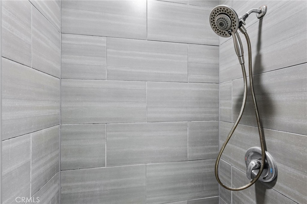 19403 Welby Way Reseda, CA 91335 - Photo 12 of 16 a bathroom with a shower