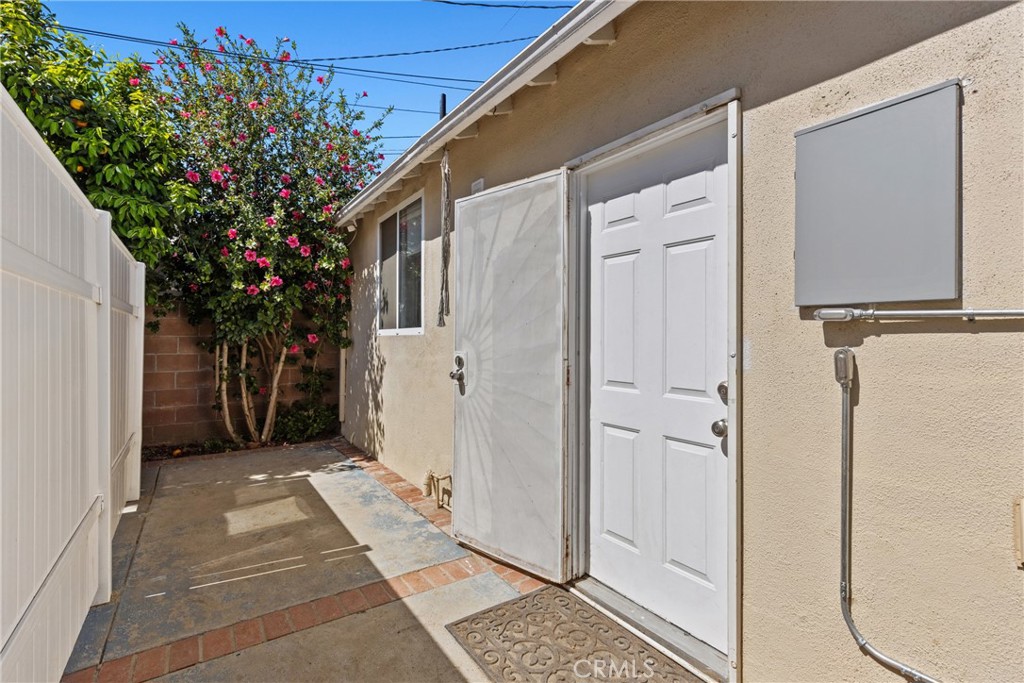 19403 Welby Way Reseda, CA 91335 - Photo 16 of 16 a view of a house with a door