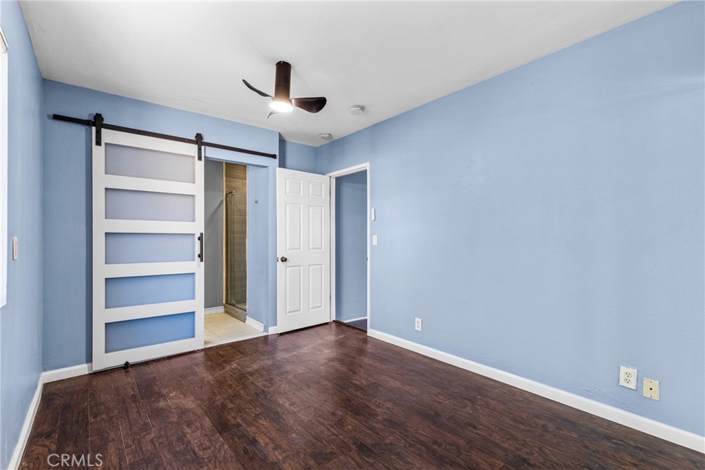 19403 Welby Way Reseda, CA 91335 - Photo 10 of 16 a view of an empty room with a window