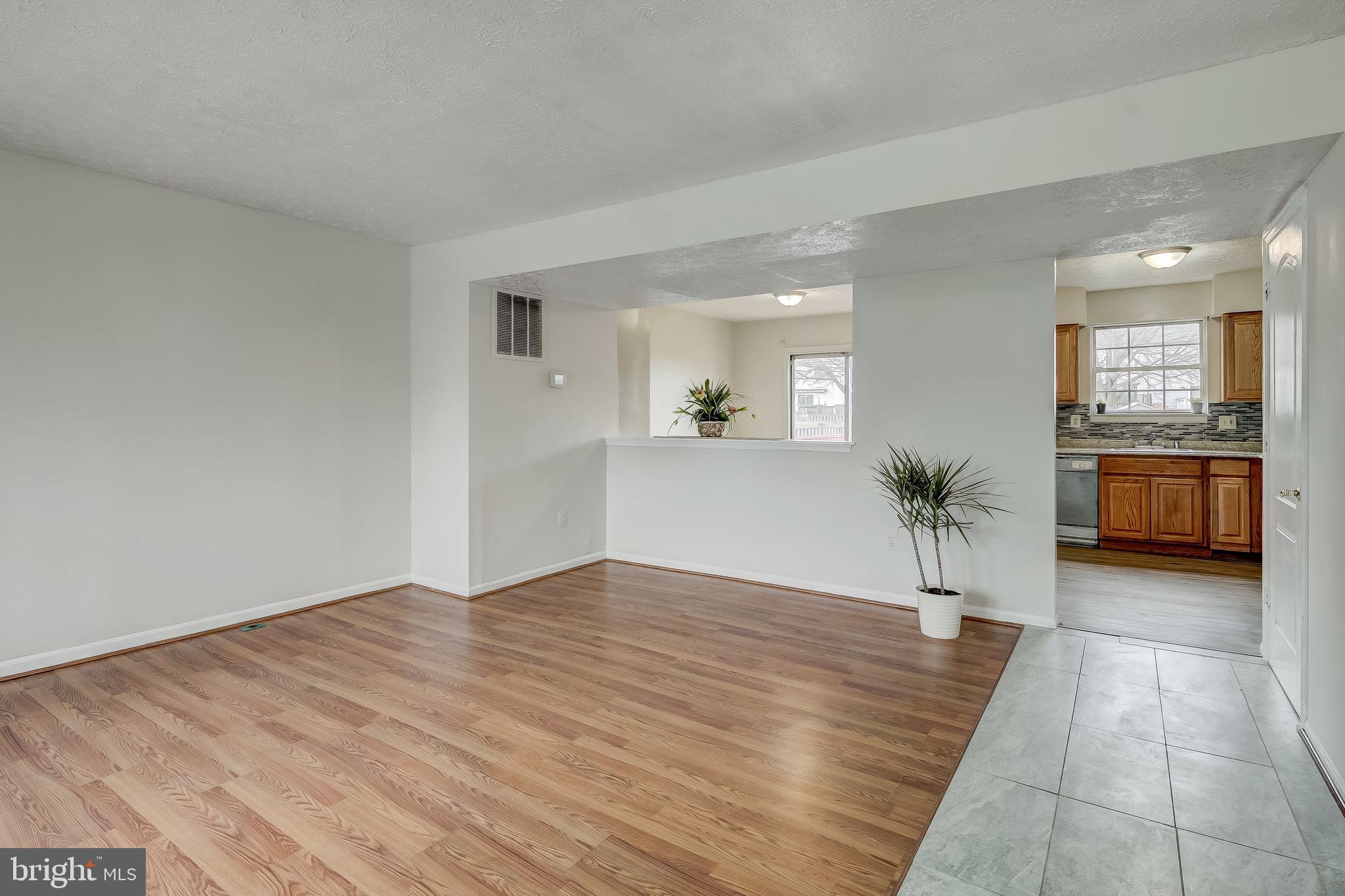 2140 Riding Crop Way Windsor Mill, MD 21244 - Photo 4 of 29 Living Room /Dining Area