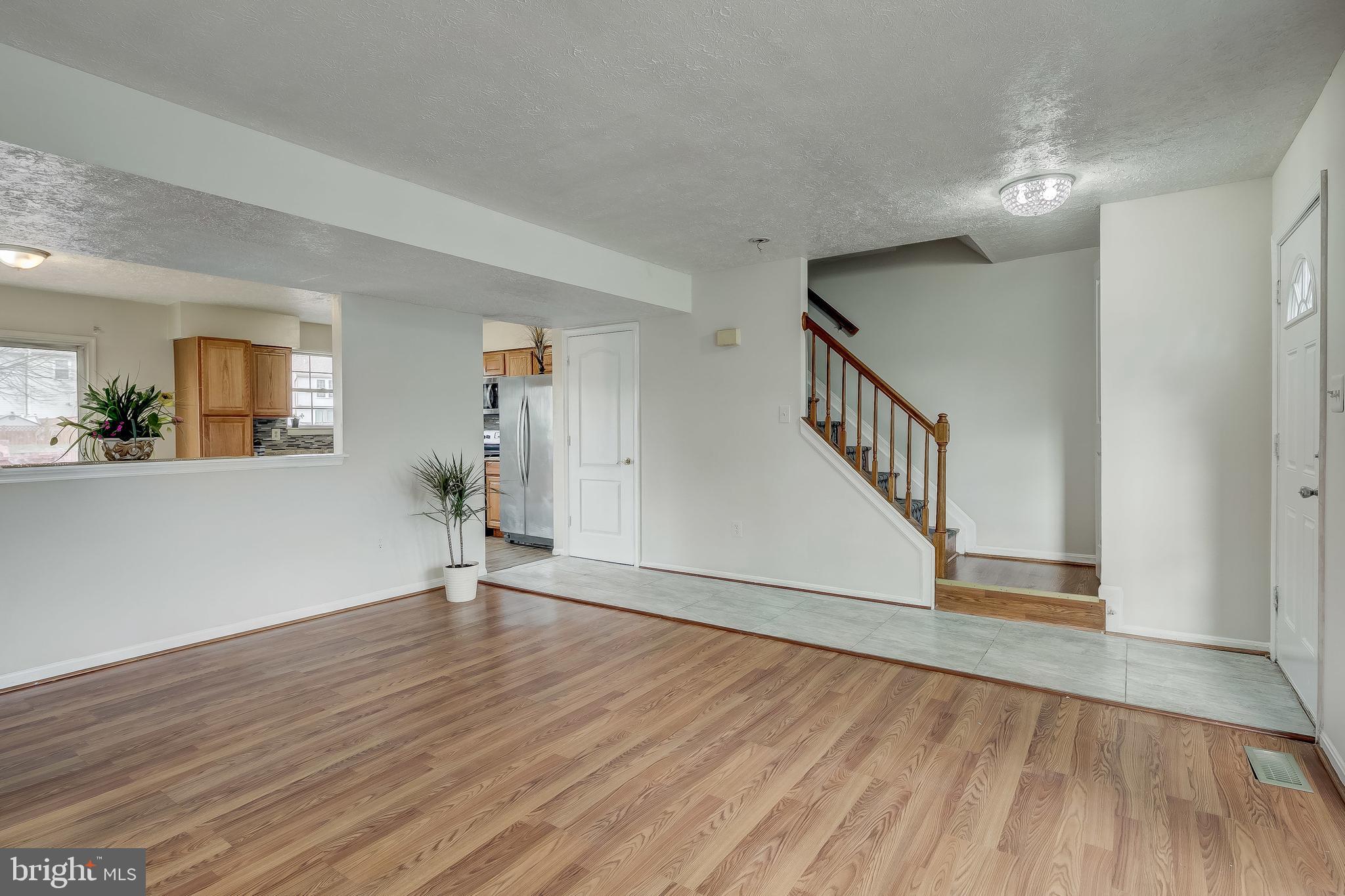 2140 Riding Crop Way Windsor Mill, MD 21244 - Photo 5 of 29 Living Room /Dining Area