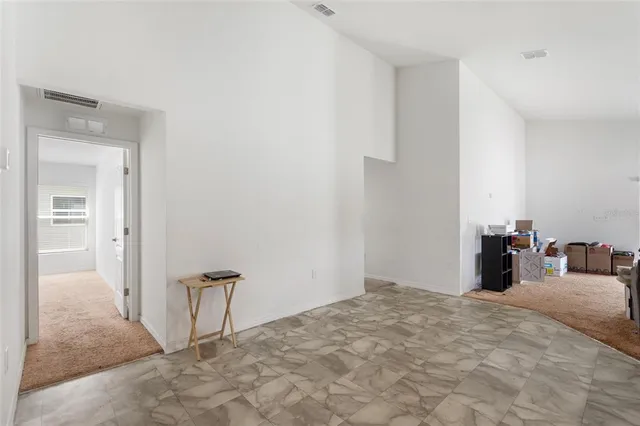 a view of a bedroom with a bed and closet