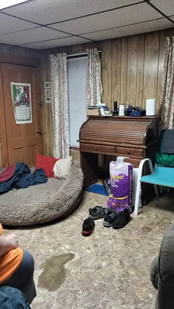 a room with furniture and window