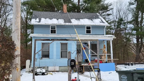 a view of house with outdoor space