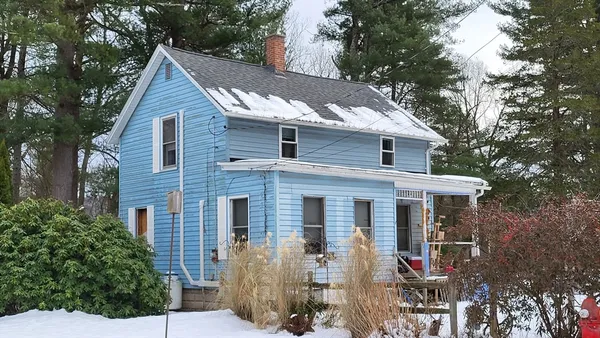 a front view of house with yard