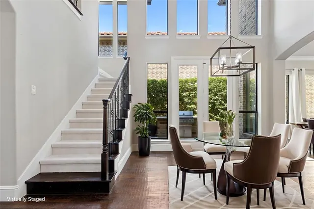 a view of an entryway with wooden floor
