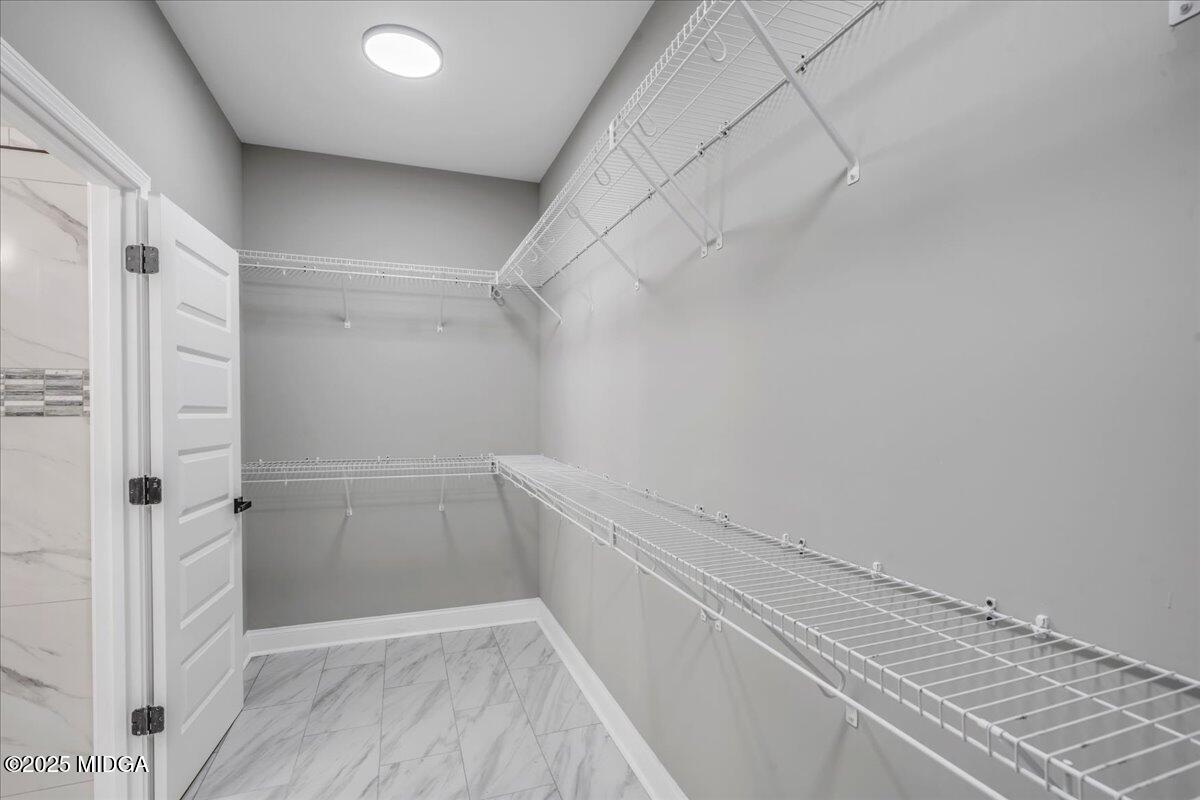 202 Eric Court Byron, GA 31008 - Photo 30 of 43 31 - Owners Suite Closet