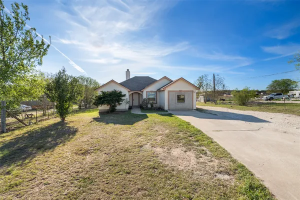 a view of house with outdoor space