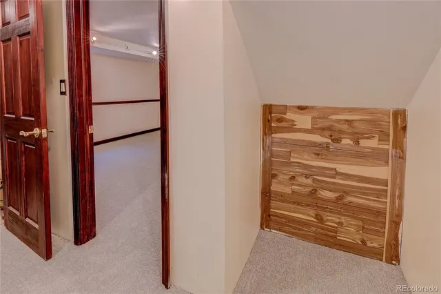 a bathroom with a sink toilet and mirror
