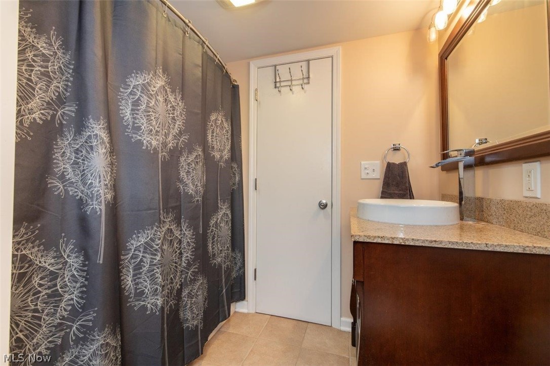 1100 Haverston Road Lyndhurst, OH 44124 - Photo 15 of 24 Remodeled Master Bathroom with Granite Counter Top