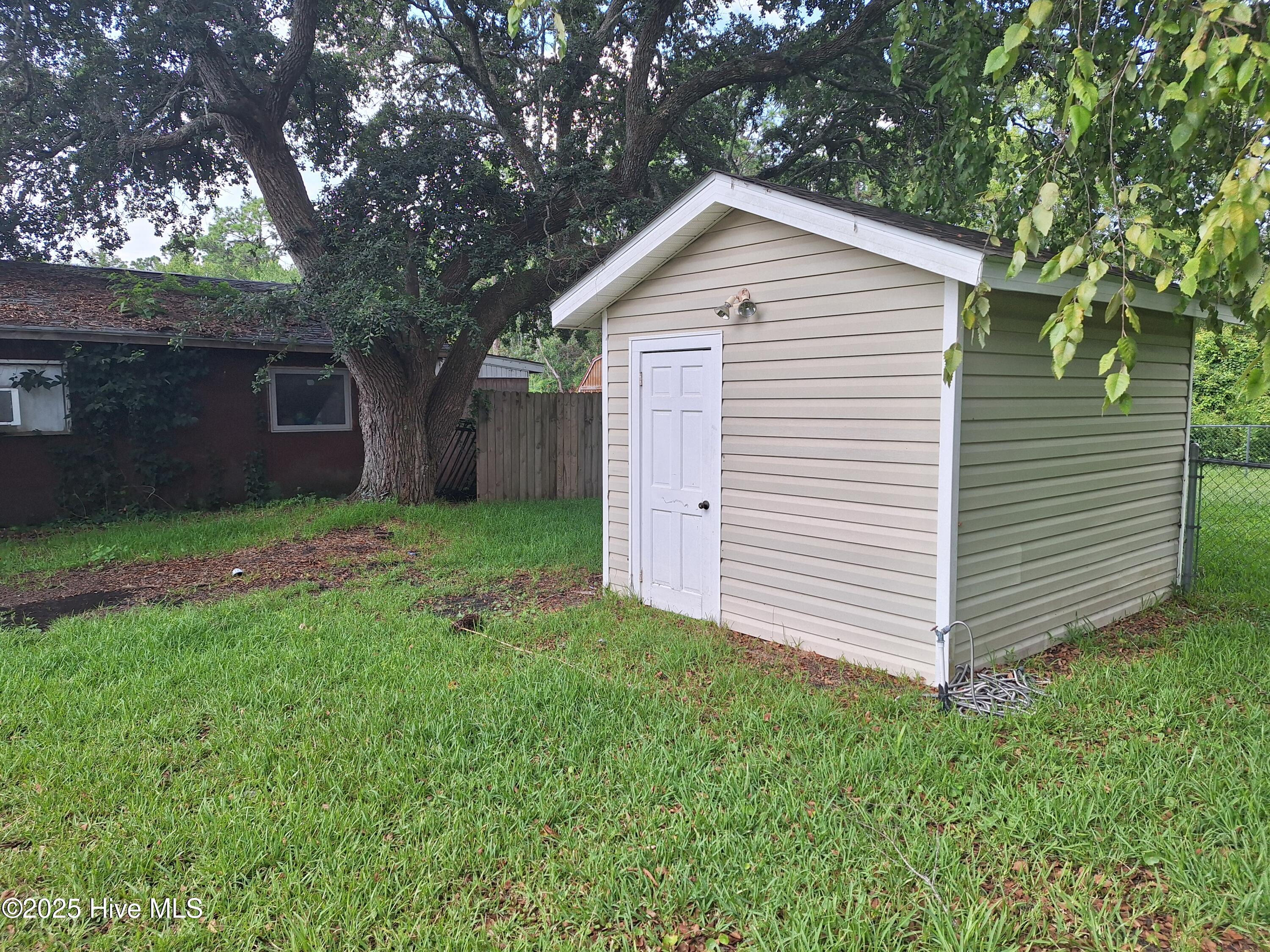 142 Florida Park Road Newport, NC 28570 - Photo 11 of 14 Back Shed