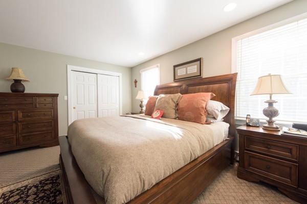 108 Flint Farm Road Middleton, MA 01949 - Photo 15 of 30 a bedroom with a bed and a night stand