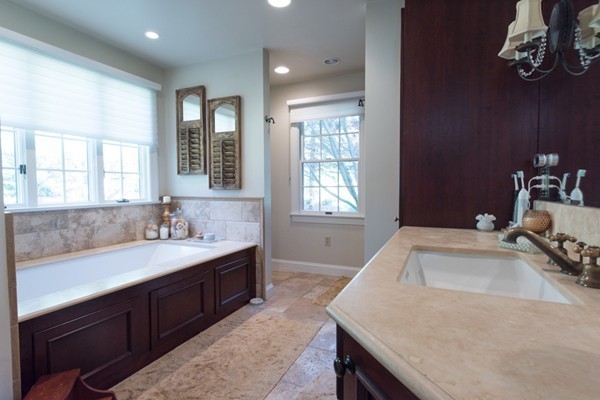 108 Flint Farm Road Middleton, MA 01949 - Photo 16 of 30 a bathroom with a granite countertop sink and mirror with window