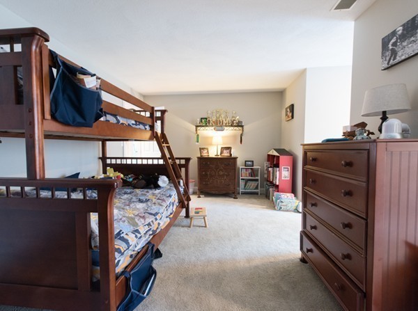 108 Flint Farm Road Middleton, MA 01949 - Photo 19 of 30 a bedroom with a bed and a tv