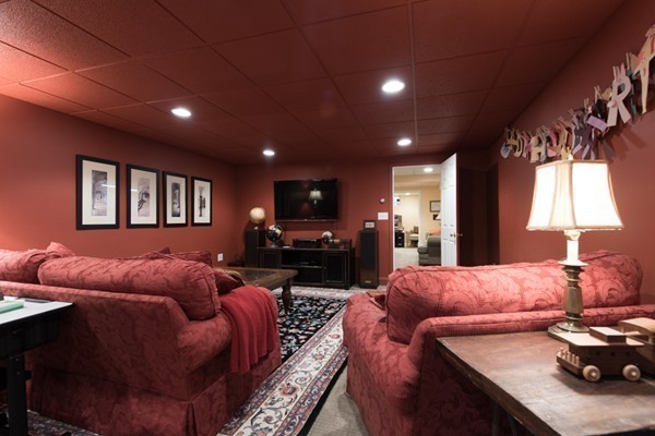 108 Flint Farm Road Middleton, MA 01949 - Photo 25 of 30 a living room with furniture a window and a couch