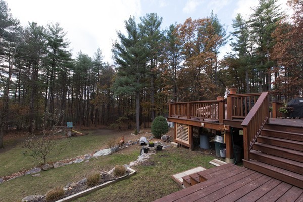 108 Flint Farm Road Middleton, MA 01949 - Photo 27 of 30 a view of deck with wooden floor and seating space