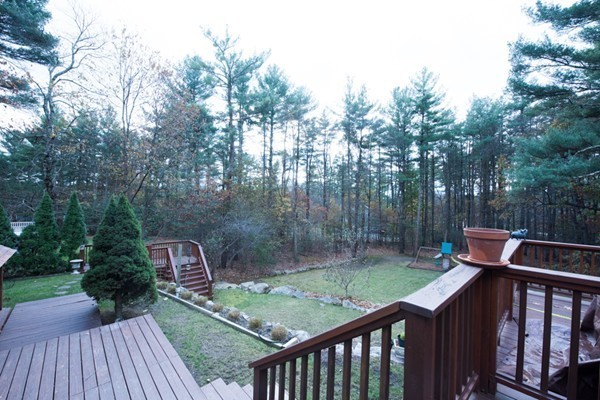 108 Flint Farm Road Middleton, MA 01949 - Photo 28 of 30 a view of a wooden deck with a backyard