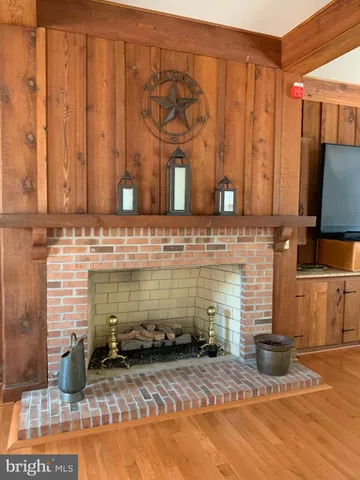 a view of outdoor space with swimming pool and trees