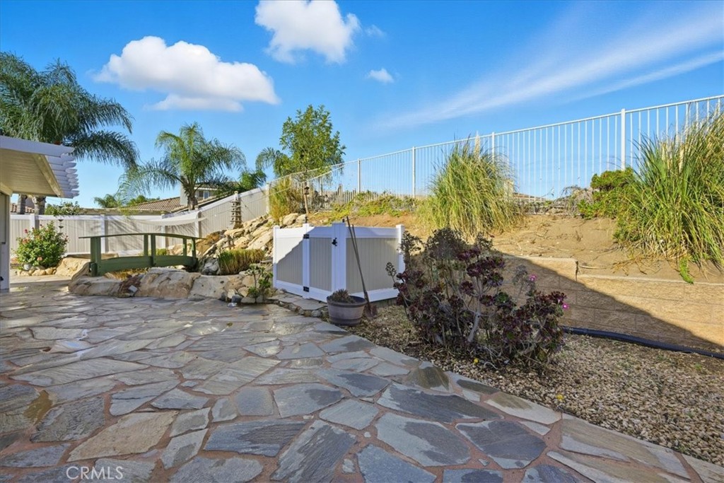 24884 Butterchurn Road Wildomar, CA 92595 - Photo 34 of 43 a view of a outdoor space with a house in background