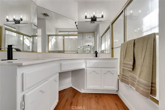 a kitchen with stainless steel appliances a refrigerator and a sink