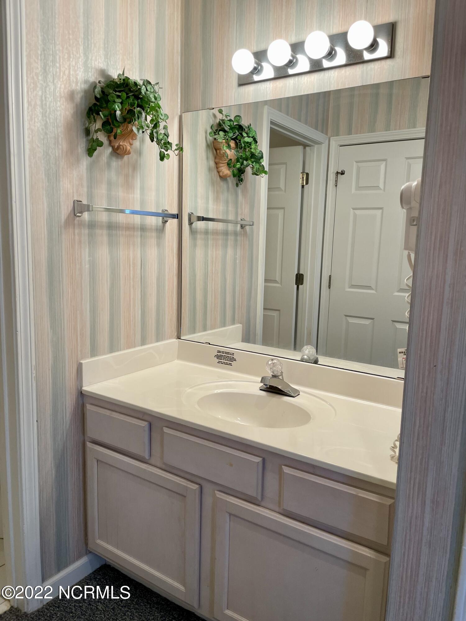 155 Royal Poste Road, Unit 3006 Sunset Beach, NC 28468 - Photo 18 of 34 Bathroom 1