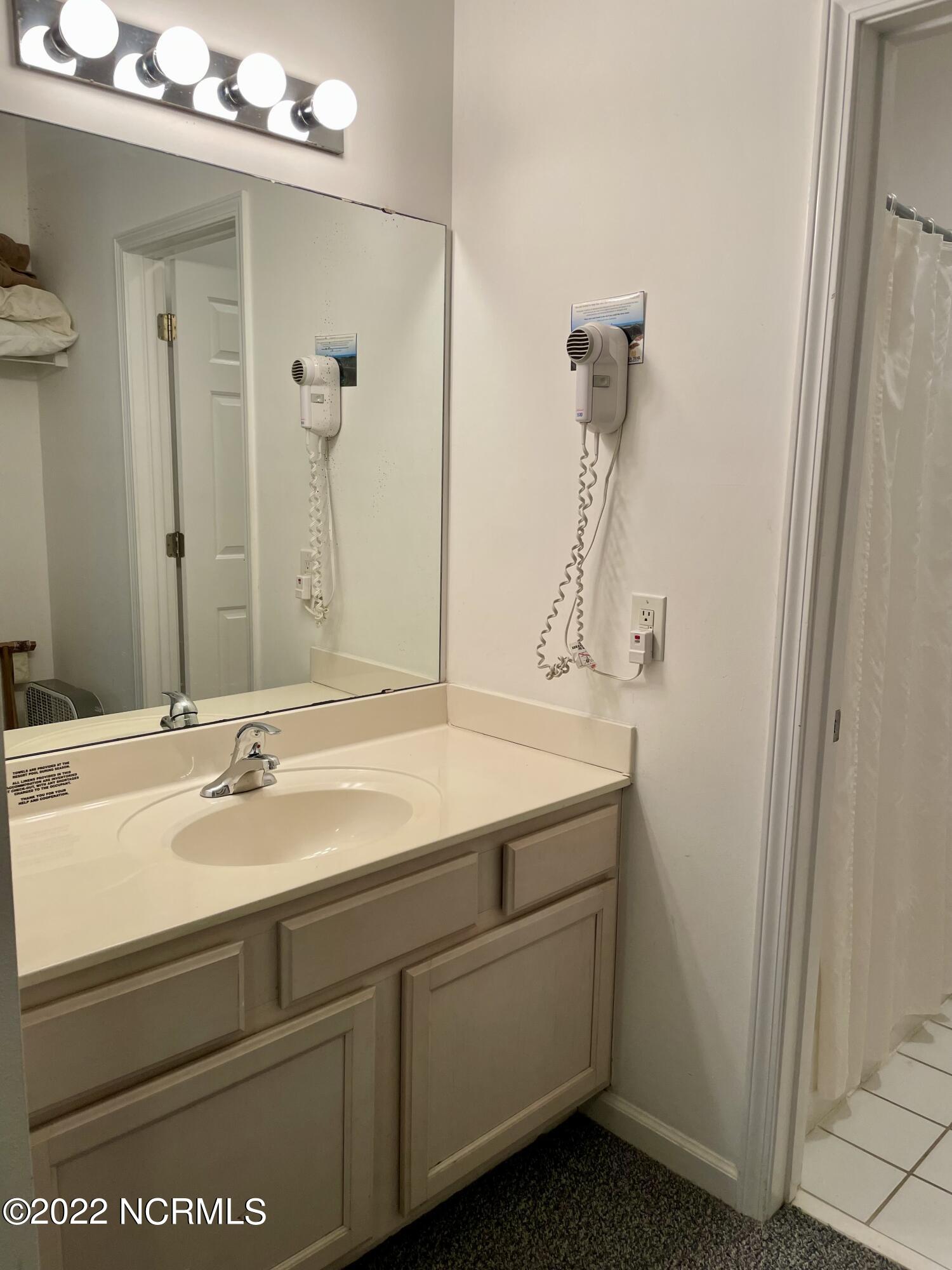 155 Royal Poste Road, Unit 3006 Sunset Beach, NC 28468 - Photo 23 of 34 Bathroom 2