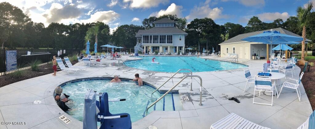 155 Royal Poste Road, Unit 3006 Sunset Beach, NC 28468 - Photo 27 of 34 Community Center Pool and Library