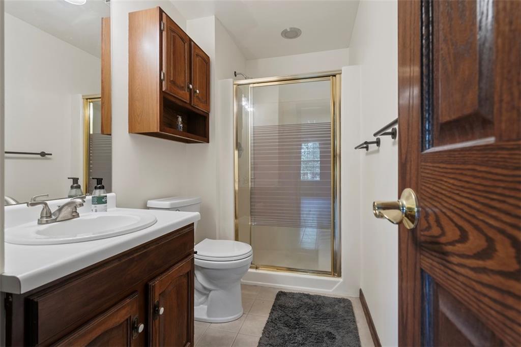 2582 Grouse Ridge, Unit A Wexford, PA 15090 - Photo 24 of 44 The attached bath has a walk-in shower with seat.