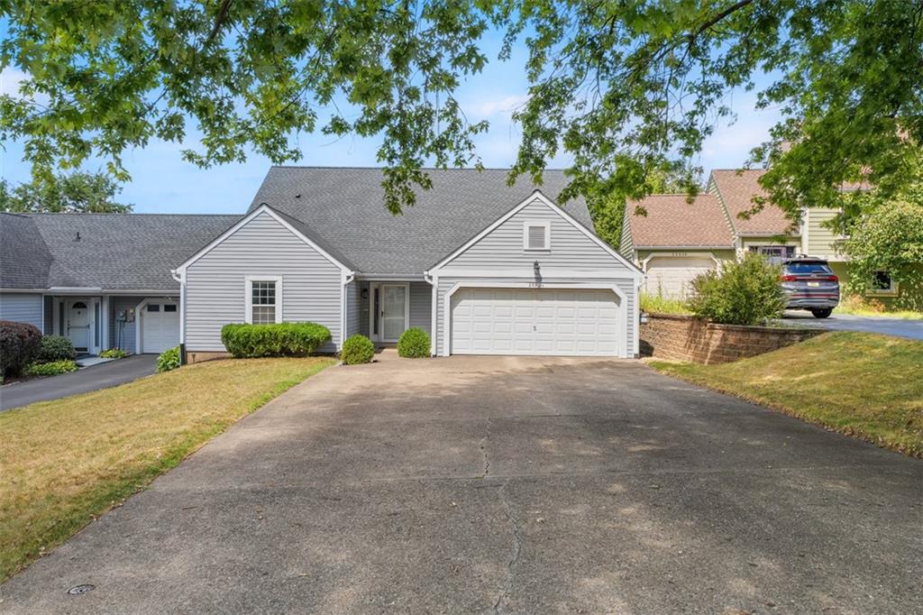 2582 Grouse Ridge, Unit A Wexford, PA 15090 - Photo 3 of 44 The 2-car garage with easy access to the kitchen makes carrying groceries a breeze.