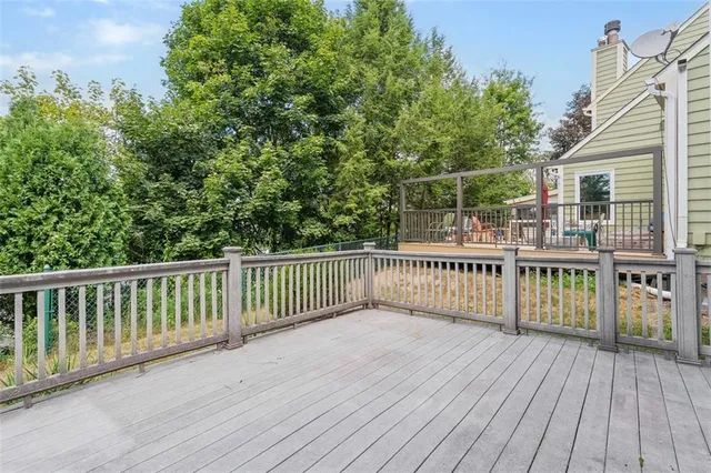 a view of backyard with deck